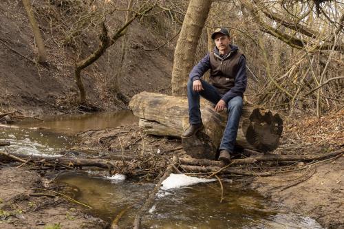 Will Munger, a doctoral student in Utah State University in the Department of Environment and Society, poses for a photo along Emigration Creek in Wasatch Hollow Preserve in Salt Lake City on Friday, April 15, 2022.Scott G Winterton, Deseret News